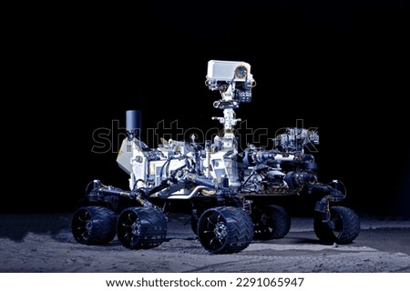 A rover on the surface of the red planet Mars. Elements of this image furnished NASA. 