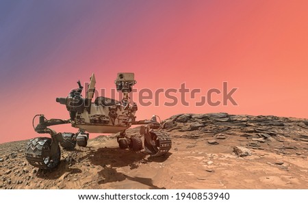 Rover Perseverance on Mars surface. Exploration of red planet. Martian rover Perseverance. Expedition of Curiosity. Elements of this image furnished by NASA