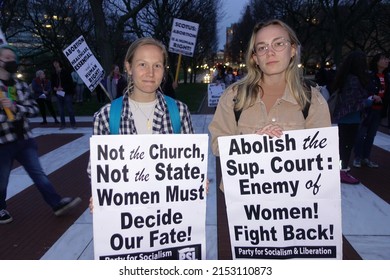 ROVIDENCE, RHODE ISLAND,USA-MAY 3, 2022: Two Women Attend The Womxn Project Roe Rally To Support Women's Reproductive Rights To Abortion Healthcare                               