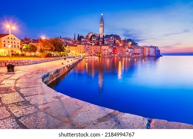 Rovinj, Croatia. Colored sunset in old town harbor, famous city of Istria Peniunsula, croatian travel landmark.