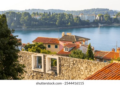 Rovinj, Croatia high angle view of traditional houses in historic old town and sea view - Powered by Shutterstock