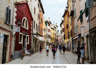 Rovinj, Croatia - July, 2016 - People Walk In The Center Of The Historic Town Of Rovinj, Croatia.