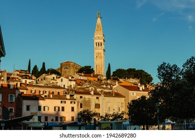 Rovinj,Istria,Croatia.View of the town situated on the coast of Adriatic Sea.Popular tourist resort and fishing port.Old town at sunrise with cobblestone streets, colorful houses and the church tower 