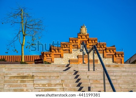 Similar – Blue railing on brick wall