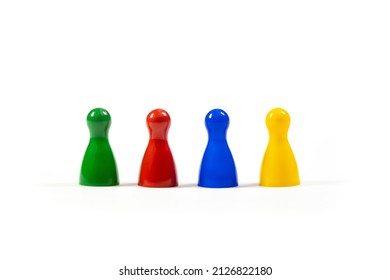 Row Of 4 Different Diverse Multi Colored Game Pieces Representing A Diverse Group Of People, Corporate Business Company Teamwork, Diversity And Togetherness Simple Metaphor, Abstract Concept, Nobody