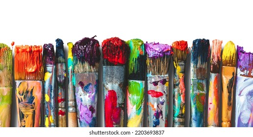 Row of artist paintbrushes closeup on white. Artistic brushes smeared with paints on white background. - Shutterstock ID 2203693837