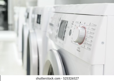 Row Of Ashing Machines In Home Appliance Store Showroom