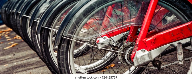 A row of bikes ready to use at a rental stand in northern Virginia. - Shutterstock ID 724425739