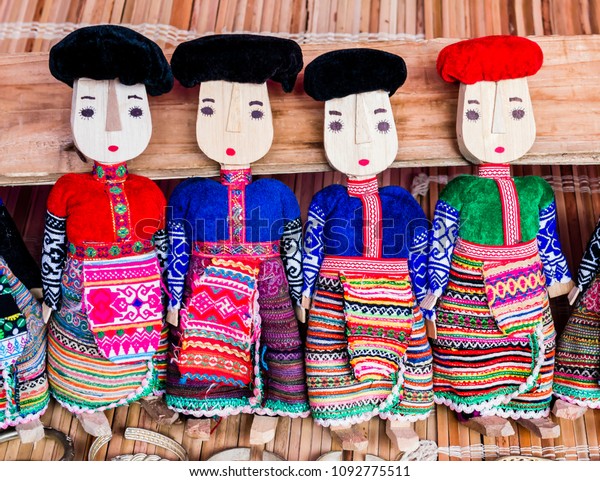 black wooden dolls