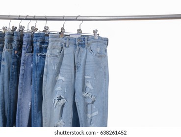 Row Blue Torn Jeans On Hanger Stock Photo 638261452 | Shutterstock