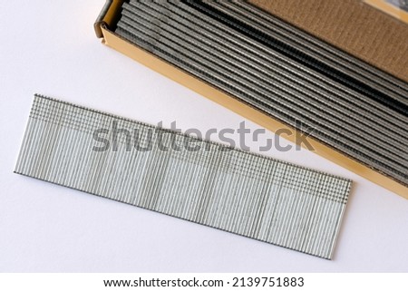 A Row of Brad Nail Fasteners