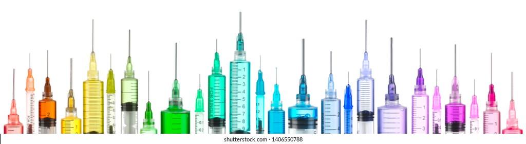 Row of bright colorful syringes