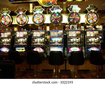 Row Of Brightly Lite Slot Machines