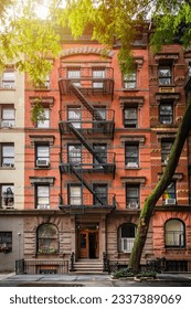 a row of brownstone buildings and in an iconic neighborhood of Manhattan, New York City.