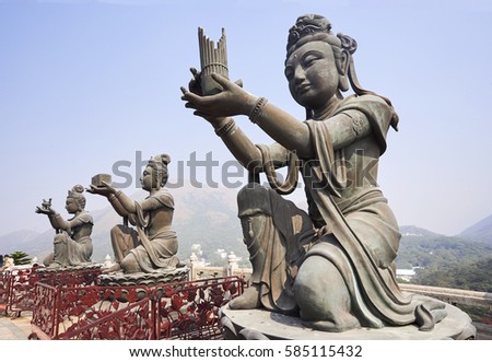 Row of Buddhas at the Tian Tan Buddha statue in Lantau Island, Hong Kong