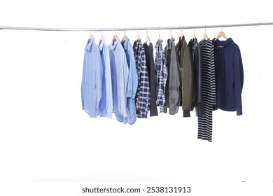 Row of business formal suit jacket , with striped ,blue shirt , plaid shirt ,with woman dress , on hanger - Powered by Shutterstock