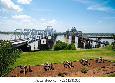 Row of canons display at historic Vicksburg battlefield overlooking old and new bridges across Mississippi River, artillery during siege of Vicksburg civil war, Mississippi, USA. Interstate 20, US 80