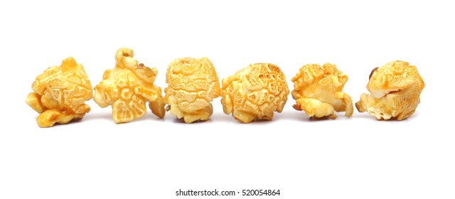 Row of caramel popcorn isolated