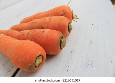 row of carrots on the table