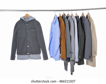 Row of casual men's clothes shirts , coat suit,on hangers - Powered by Shutterstock