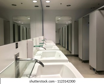 Row of ceramics wash basin in public restroom - Shutterstock ID 1123142300