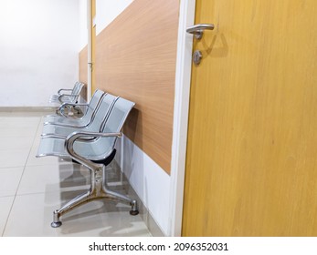 Row Of Chair In Doctor Waiting Room With No People.