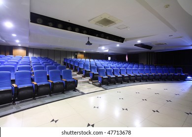 row of chair in theater interior
