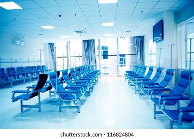 Row Of Chairs In A Infusion Room Of Hospital.