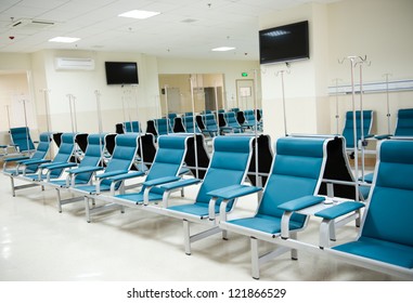 Row Of Chairs In A Infusion Room Of Hospital.