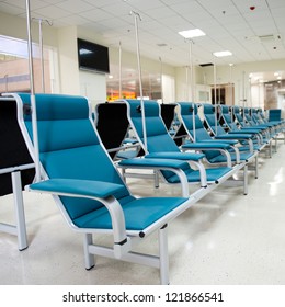 Row Of Chairs In A Infusion Room Of Hospital.