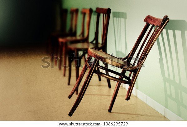 Row Chairs One Which Broken Leg Stock Photo (Edit Now) 1066295729