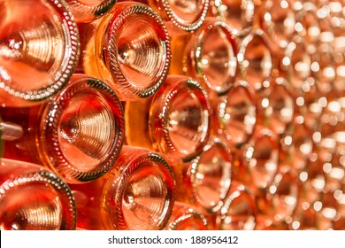 A row of champagne bottles - Wine cellar Bottles of wine stocked in a wine cellar. - Shutterstock ID 188956412