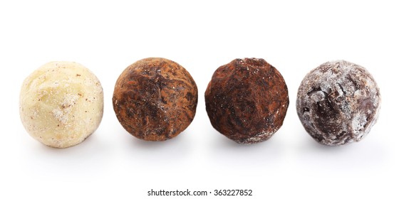 Row Of Chocolate Truffles, Isolated On White