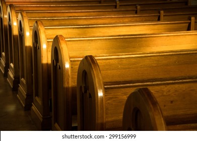 A row of church benches. - Powered by Shutterstock