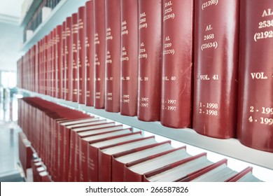 Row Of Classic Books In Modern Office Bookshelf