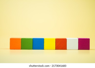 A Row Of Color Wood Blocks. Wooden Building Blocks