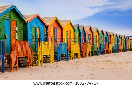 Row of colorful bathing huts in Muizenberg beach, Cape Town, South Africa

