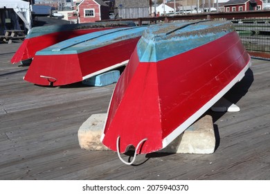 Row of Colorful Dory Fishing Boats lined on Dock; Gloucester, Massachusetts