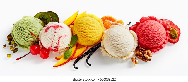 Row of colorful ice cream scoops with decorations, shot from above, isolated on white background