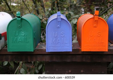 Row Of Colorful Mailboxes.