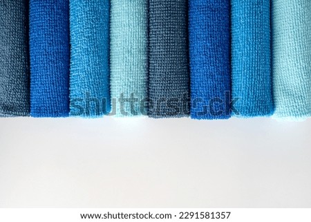 A row of colorful microfiber cloths for housekeeping and cleaning Imagine de stoc © 