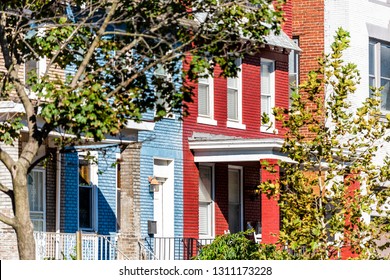 Row Of Colorful Red And Blue Painted Brick Residential Townhouses Homes Houses Architecture Exterior Entrance In Washington DC Capitol Hill Neighborhood District