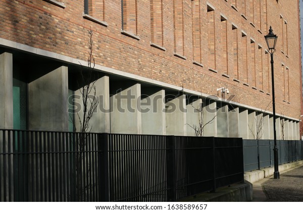 Row of concrete columns showing\
perspective. Columns from an office block in\
England.