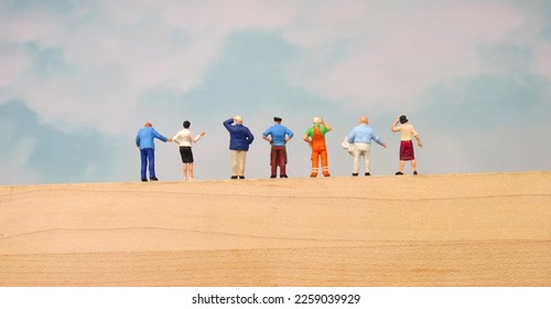 Row of Confused Miniature People staring into the Distance. - Shutterstock ID 2259039929