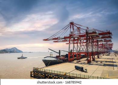 A Row Of Crane In Shanghai Container Deepwater Port ,foreign Trade And Port Machinery Background 