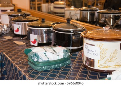 Row Of Crock Pots For Chili Cook Off Contest In Restaurant