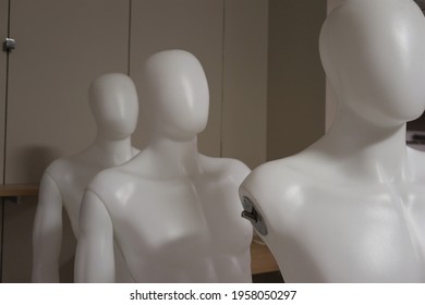 Row Of Damaged And Discarded Department Store Mannequins