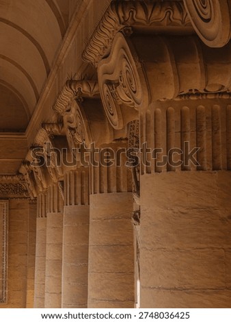 Row of decorated Ionic columns at rotunda in Mosta