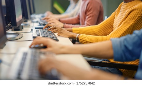 Row Of Diverse Group Of Multi-Ethnic People Works On PC. Office Team Of Technical Support Staff Members Work On Computers, Help People Find Solutions. Shot Focus On Hands