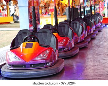 A Row of Dodgem Cars on a Fun Fair Amusement Ride. - Shutterstock ID 39758284